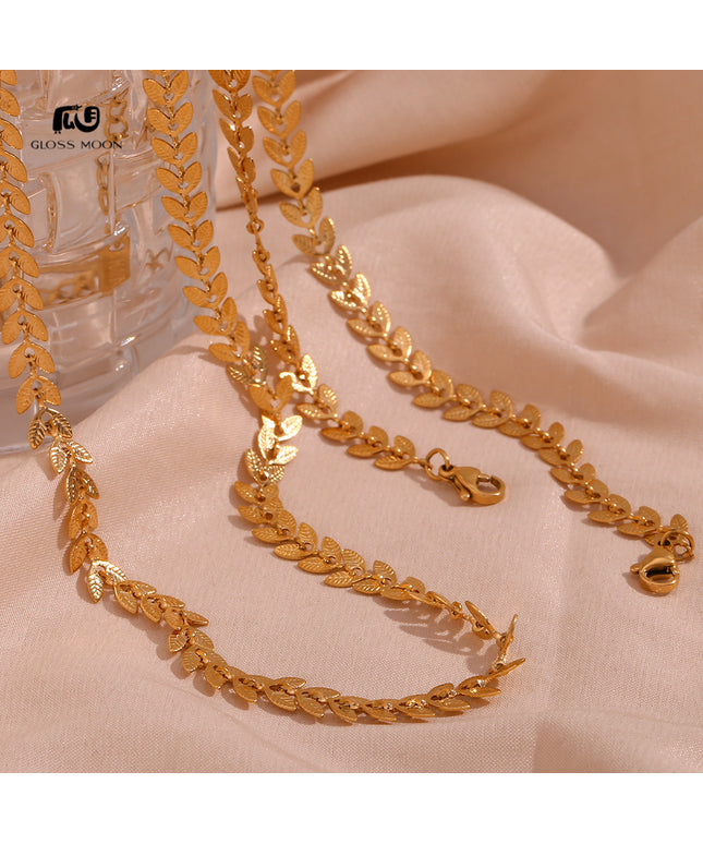 Glossmoon European and American Simple Niche Hot-Selling Titanium Steel Bracelet and Anklet Set Stainless Steel 18K Gold Plated Leaf Fish Tail Chain Necklace