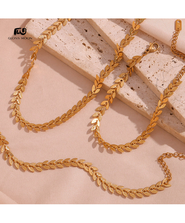 Glossmoon European and American Simple Niche Hot-Selling Titanium Steel Bracelet and Anklet Set Stainless Steel 18K Gold Plated Leaf Fish Tail Chain Necklace