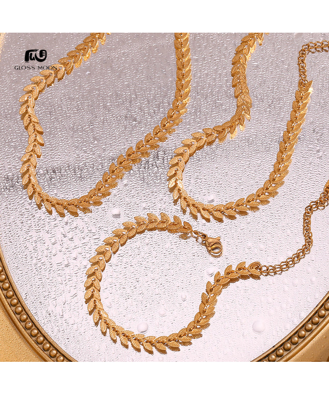 Glossmoon European and American Simple Niche Hot-Selling Titanium Steel Bracelet and Anklet Set Stainless Steel 18K Gold Plated Leaf Fish Tail Chain Necklace